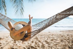 Woman having summer vacation on beach