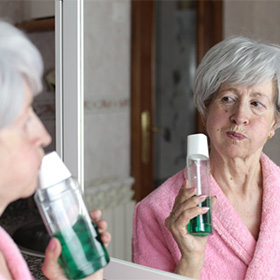 Dentures patient in Orange preparing for oral care