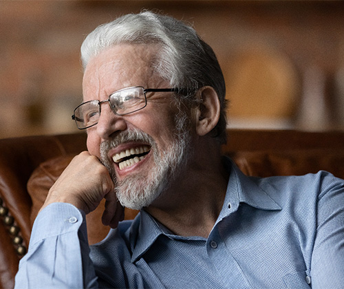 A dental patient smiling happily.
