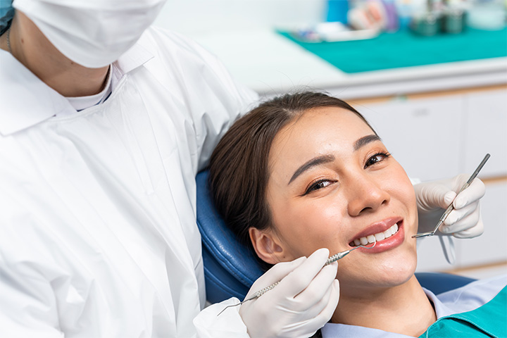Woman smiling at the dentist.